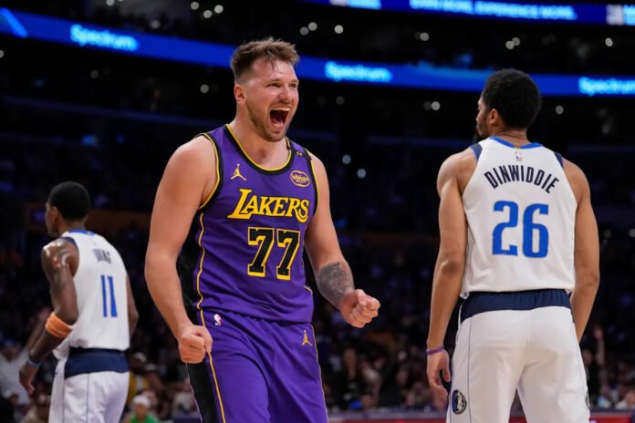 Luka Dončić drops 45 points on Mavericks after wiping back tears in return to Dallas