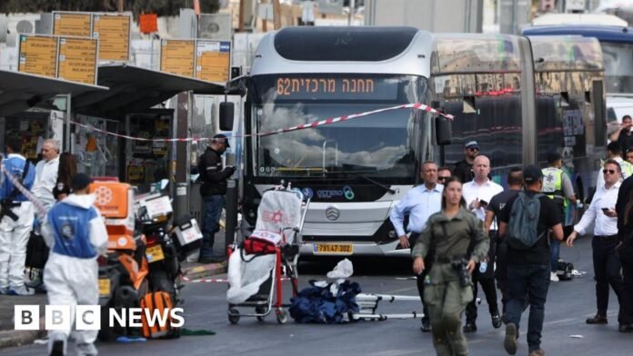 Six killed by Palestinian gunmen at Jerusalem bus stop