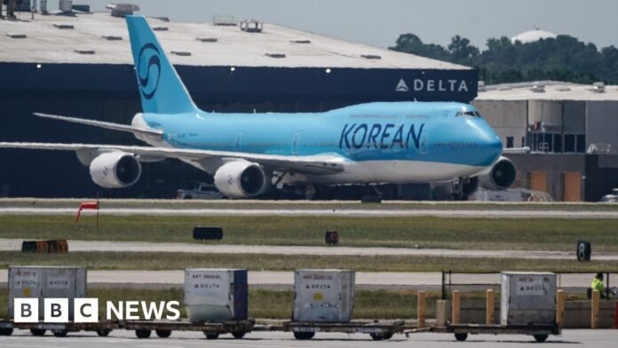 South Korea workers detained in US raid head home South Korea workers detained in US raid head home