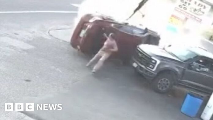 Moment man narrowly avoids being hit by car in Nebraska Moment man narrowly avoids being hit by car in Nebraska petrol station crash