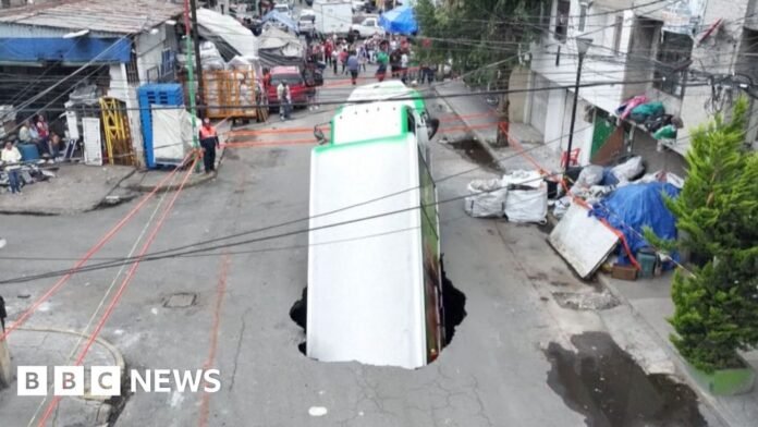 Soda truck falls into sinkhole in Mexico City Soda truck falls into sinkhole in Mexico City