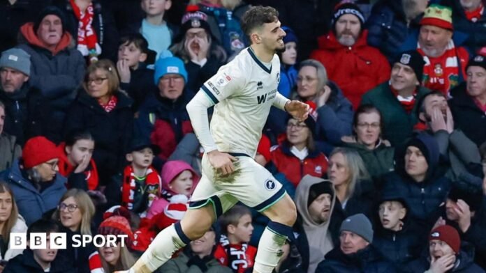 Wrexham 0-2 Millwall: Lions boost Championship play-off hopes with victory